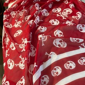 Red scarf with skeleton.